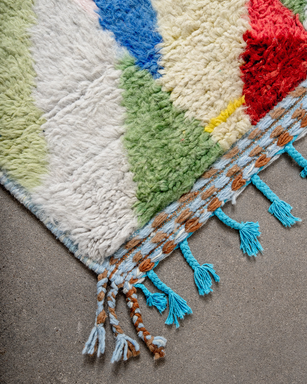 Modern, designer, handcrafted Berber rug from Morocco. Beniourain carpet with beautiful colours and patterns and fluffy wool texture.